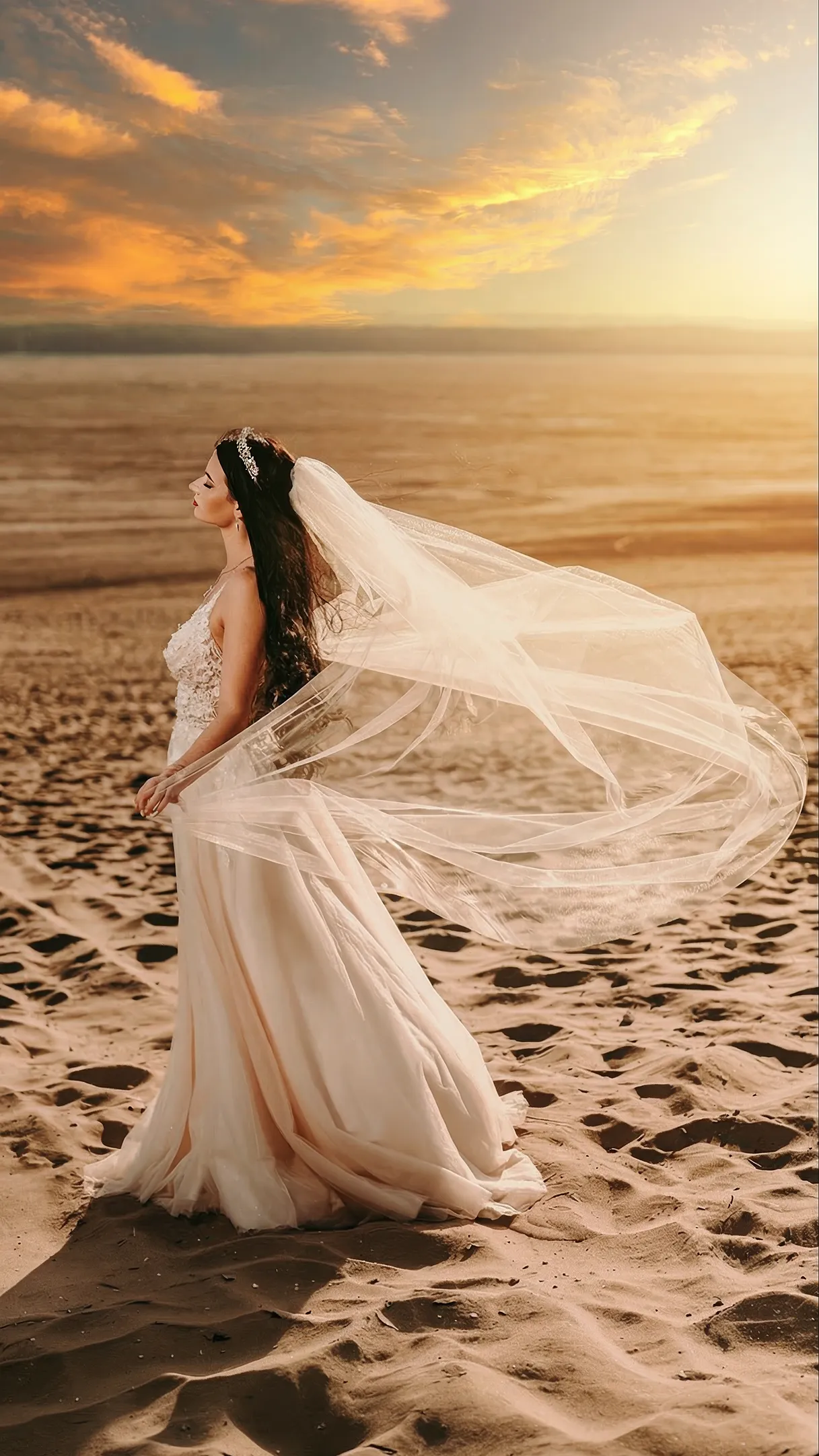 mloda pani w pieknej sukni z dlugim welonem na sesji slubnej na pustyni bledowskiej